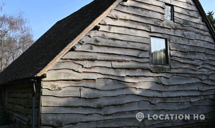 Traditional barns and stone outbuildings on period property