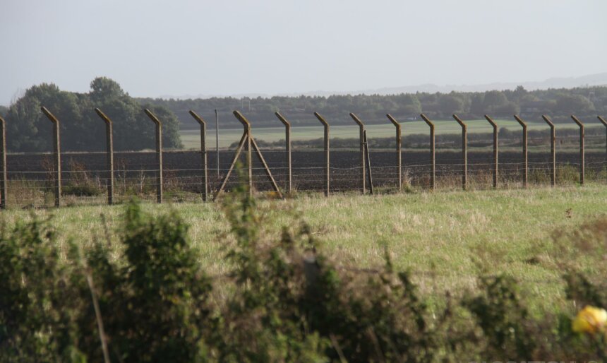 Prison fence line filming