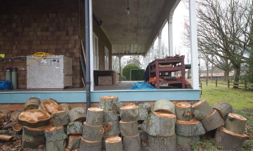 Wood pile outside a residential property, available for film shoots and photography