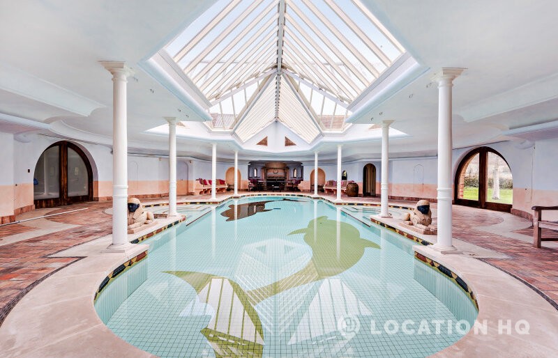 Swimming pool with glass skylight filming