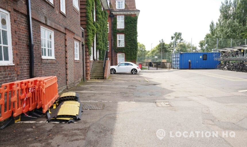 Unit base Film crew parking Gravel lot Film trailer base Production vehicle