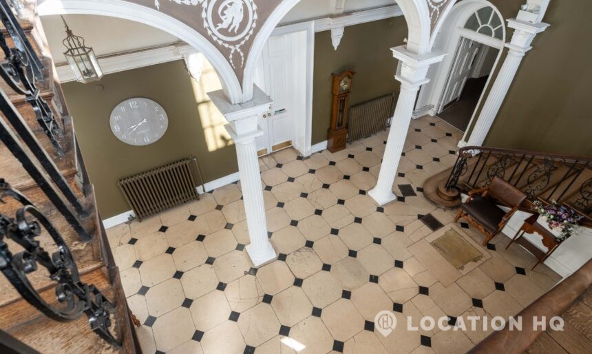 black and white tiled floor lobby