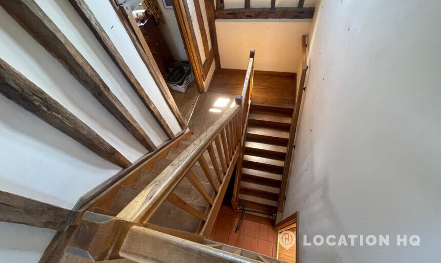 wooden staircase in a multi storey oast house kent